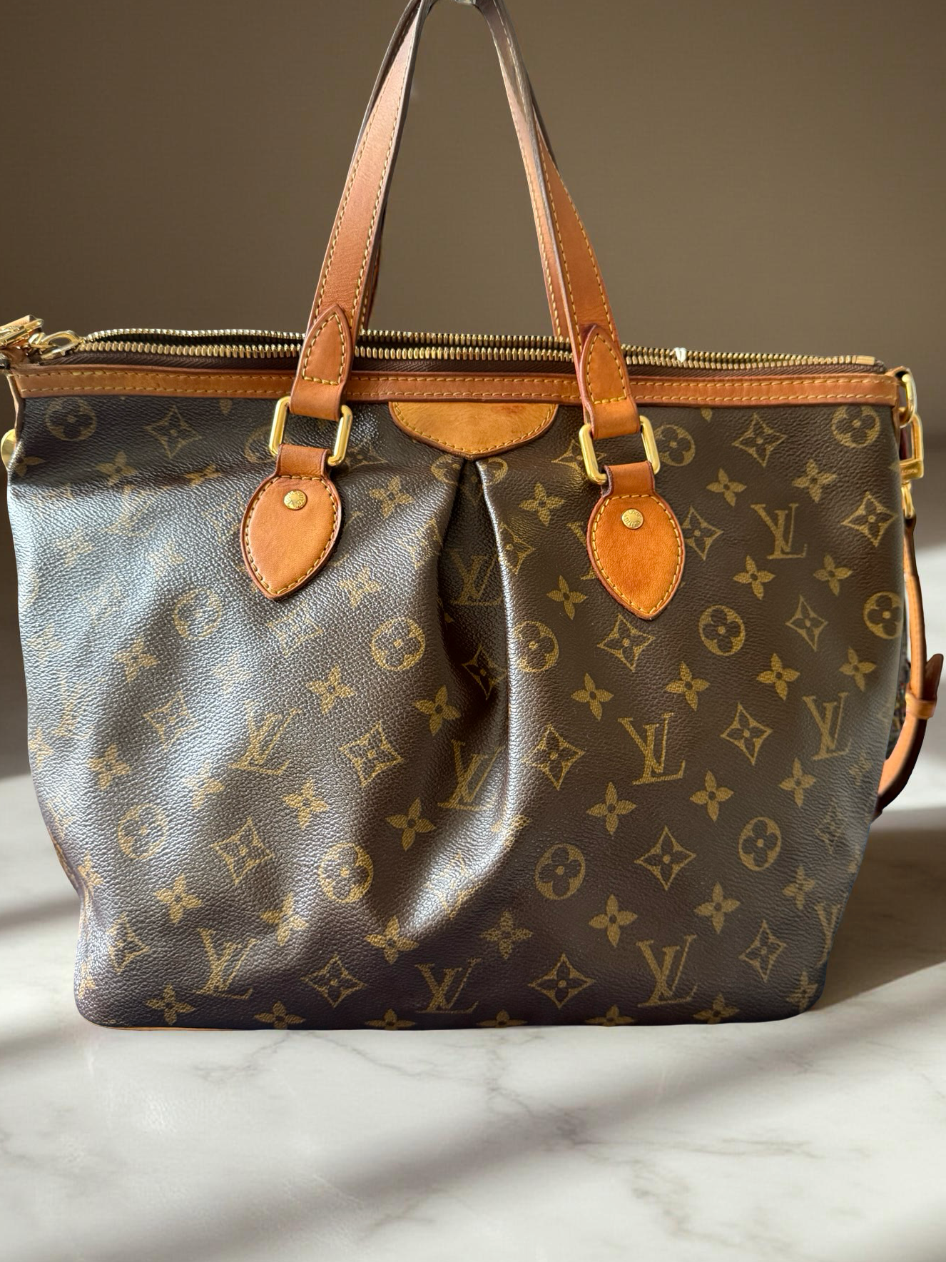 Louis Vuitton Palermo Pm med ekthetsbevis.