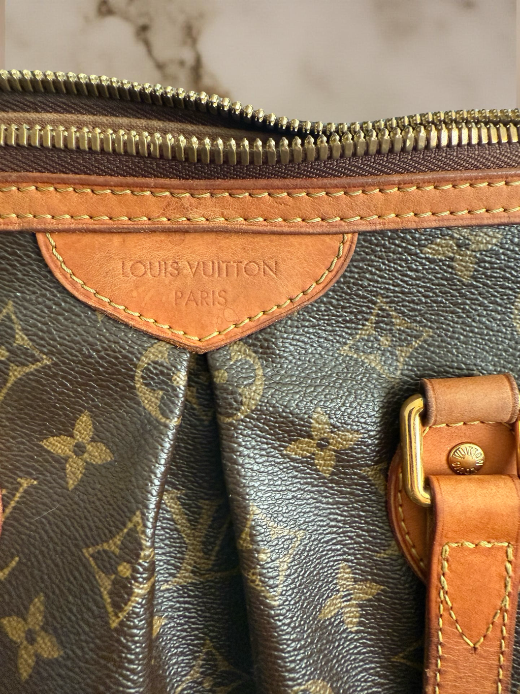Louis Vuitton Palermo Pm med ekthetsbevis.