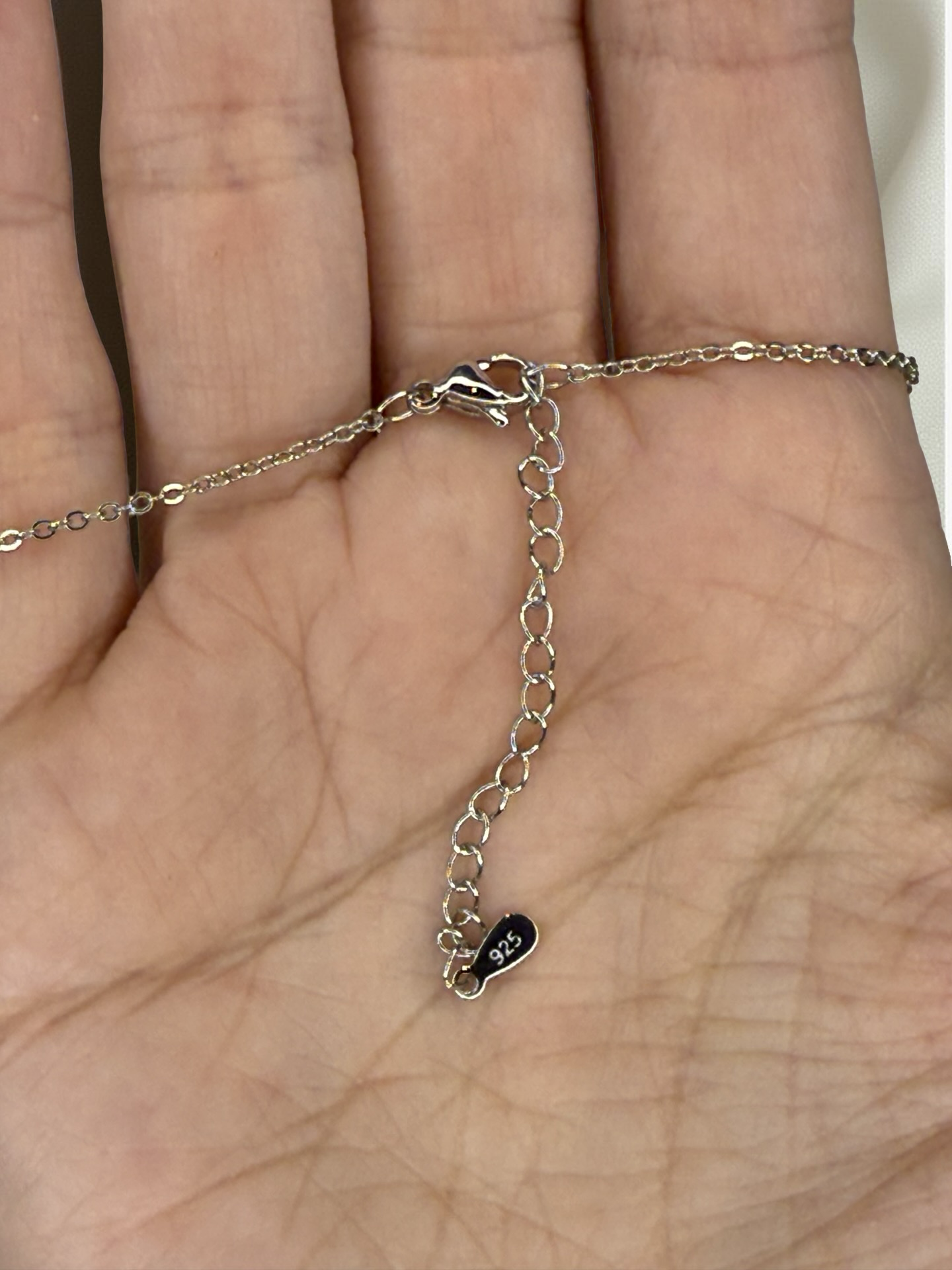 Heart-shaped design on jewelry set in 925 sterling silver and zirconia